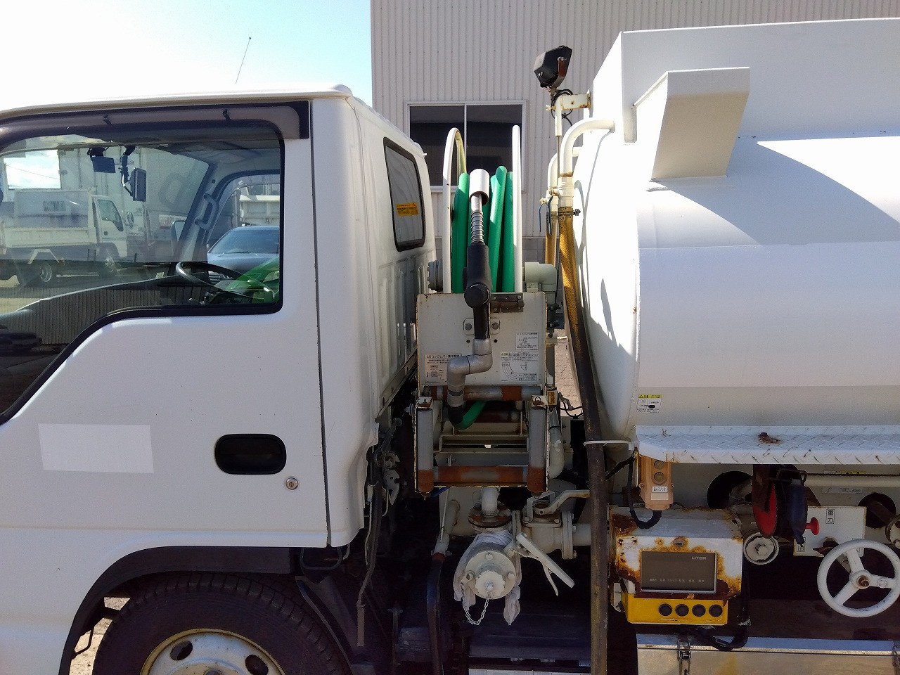 いすゞ エルフ TDG-NKS85AN(4WD)の写真10