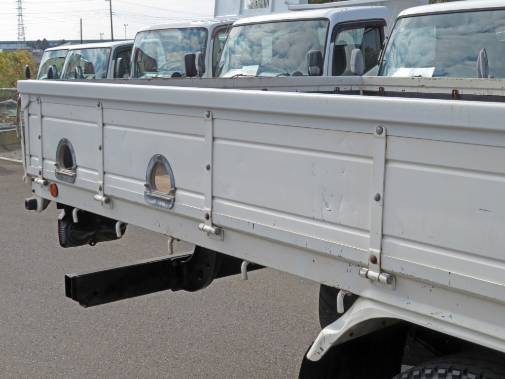 運転席側あおり後方に細かいキズ・ヘコミがあります。|日野 レンジャー TKG-FC9JKAP(2WD)の写真42