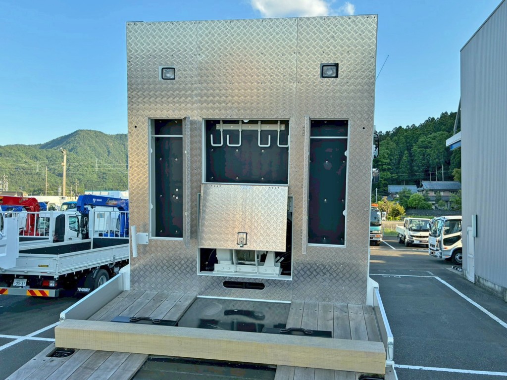 プロテクターはレバーブロック掛け付きの物入れが付いています。|日野 プロフィア 2DG-FW1AHCの写真12