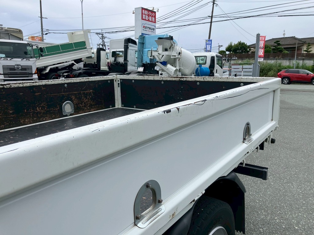 助手席側アオリ上縁にスレ引き傷があります。|三菱 キャンター 2PG-FEAV0(2WD)の写真26