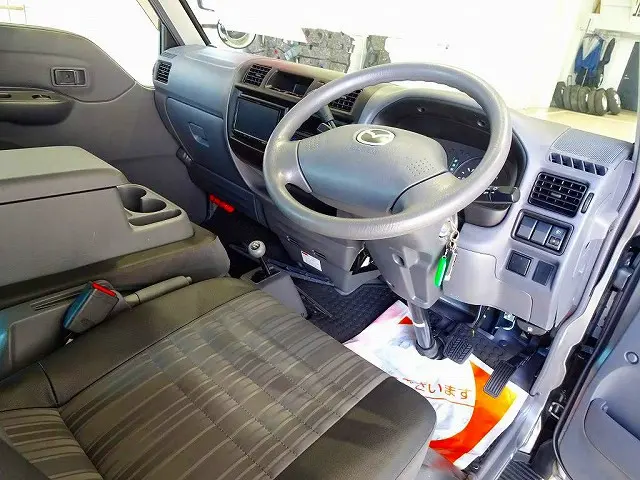 AC　PS　PW　SRS　ABS　キーレス　左ミラー電動角度調整　社外メモリーナビ/バックカメラ連動/ワンセグTV/DVD(MDV-D406BT)　ETC　ドライブレコーダー　間仕切りカーテン付|マツダ ボンゴバン DBF-SLP2M(4WD)の写真5