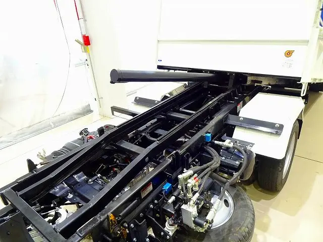 荷台内寸:300×159×38 新明和/SD2-32 三方開 手動シート(開き止め付) リアアオリ左右ピン差し加工 鳥居上部左右角出し(脱着可)/枕木取付 右シャシリアスライド用スイッチコード|いすゞ エルフ TPG-NKR85ANの写真29