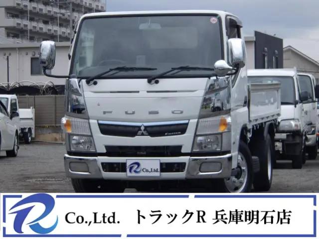 積載量３０００㎏　車両総重量５５９５㎏　荷台内寸　３１０×１６０×３８　車両外寸　４６９×１６９×１９９　荷台地上高約９８㎝　高床　荷台床鉄板張り　１０尺　ＡＴ　車両総重量７．５ｔ未満　５速ＭＴ|三菱 キャンター TPG-FBA50(2WD)の写真1