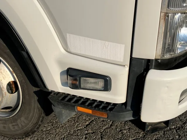 運転席側ドア下部に看板消し塗装跡があります。|いすゞ フォワード TKG-FRR90S1(2WD)の写真33