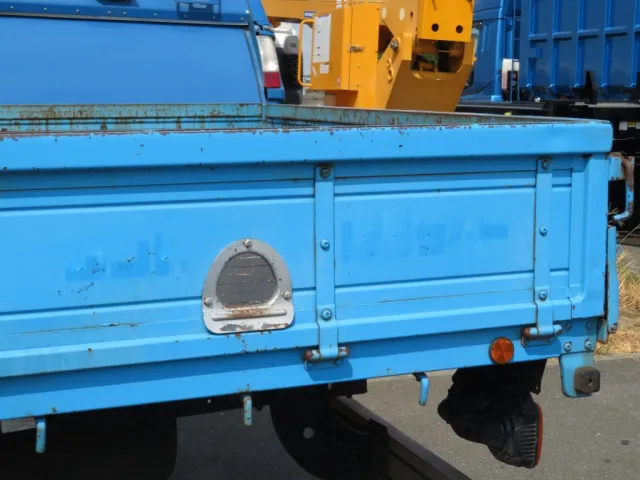 助手席側あおり後方に看板日焼け跡があります。|日野 レンジャー BKG-FC7JKYA(2WD)の写真15